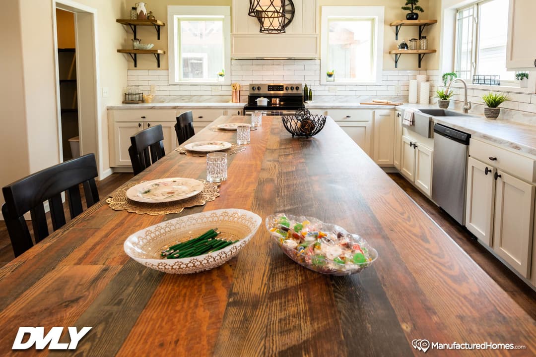 The adriel corner ½ rock fireplace kitchen home features