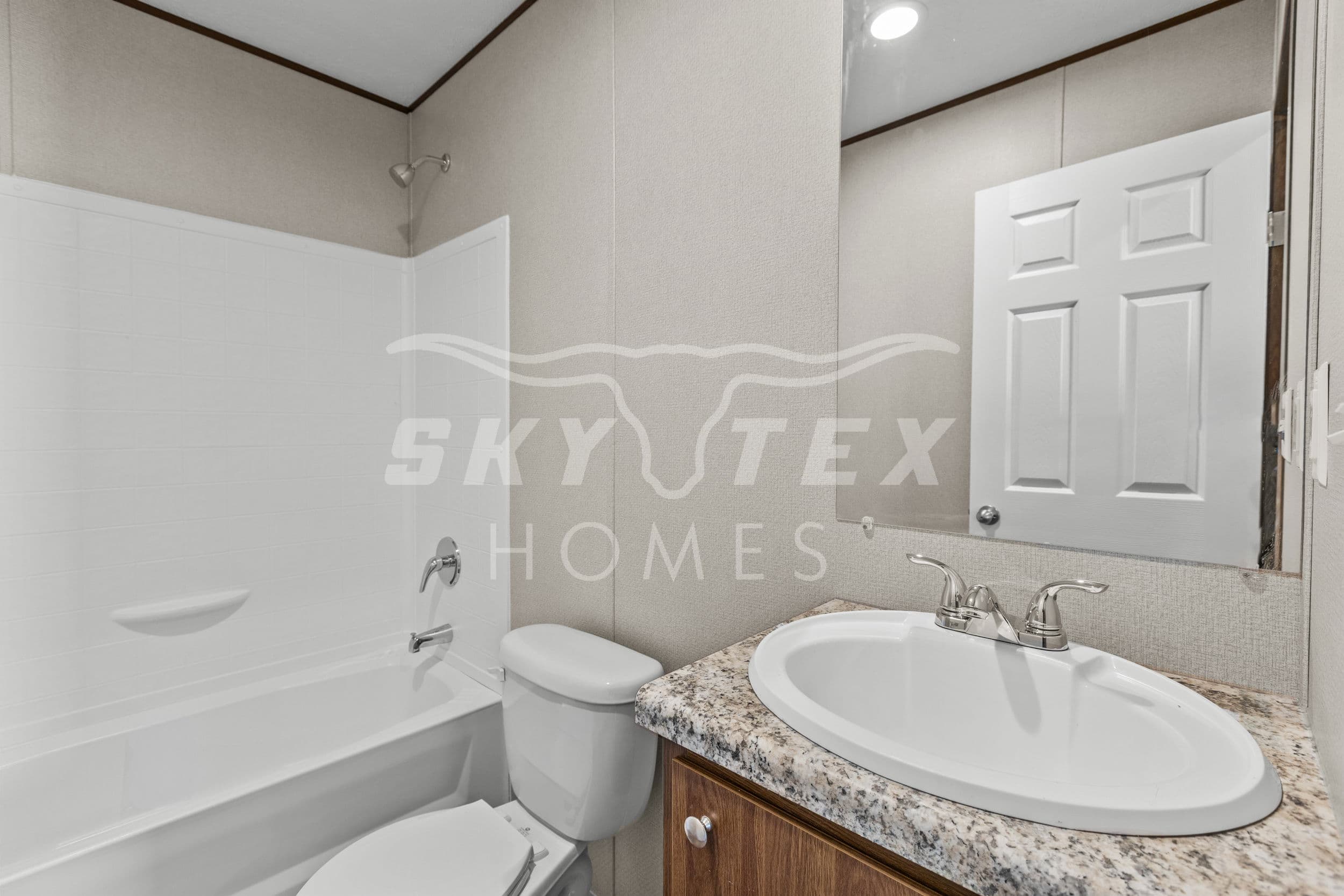 Oak interior and bathroom home features